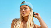 Olivia Dunne was photographed in Bermuda by Ben Watts. Swimsuit by Andi Bagus. Hat by 47 Brand.