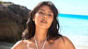 Lauren Chan was photographed by Ben Watts in Bermuda. Swimsuit by Mare Perpetua.