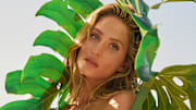 Alix Earle was photographed by Yu Tsai in Jamaica. Swimsuit by Bamba Swim. Body chain by Jacquie Aiche.