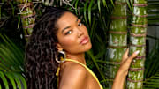 Ming Lee Simmons was photographed by Yu Tsai in Jamaica. Swimsuit by Lybethras. Earrings by Ettika.