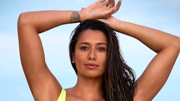 Malia Manuel was photographed by James Macari in Turks and Caicos. Swimsuit by HAUS OF PINK LEMONAID.