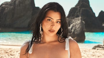 Lauren Chan was photographed by Ben Watts in Bermuda. Swimsuit by Beach Riot. Earrings by JÉBLANC.