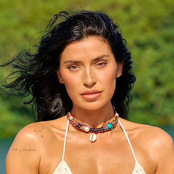 Nicole Williams English was photographed by Yu Tsai in Jamaica. Swimsuit by Akoia Swim. Necklace by Joie DiGiovanni.