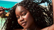 Achieng Agutu was photographed by Ben Watts in Bermuda. Swimsuit by iNAMORATA WOMAN.