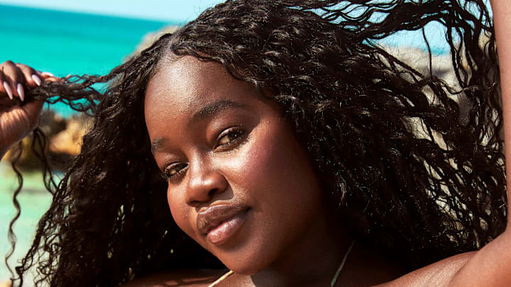Achieng Agutu was photographed by Ben Watts in Bermuda. Swimsuit by iNAMORATA WOMAN. Achieng Agutu was photographed by Ben Watts in Bermuda. Swimsuit by iNAMORATA WOMAN.