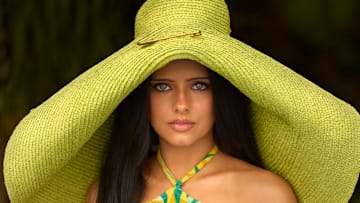 Jessie Murph was photographed by Derek Kettela in Key Biscayne, Fla. Swimsuit and hat are vintage. Hat by Jacquemus.