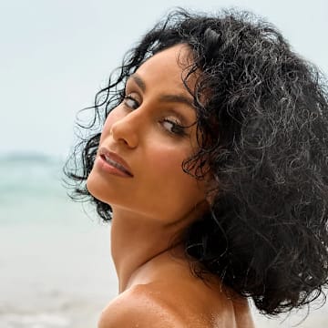 Nazanin Mandi was photographed by Yu Tsai in Jamaica. Swimsuit by Indah. 