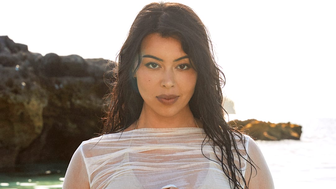 Lauren Chan was photographed by Ben Watts in Bermuda. Swimsuit by It’s Now Cool. Shirt by Enza Costa.