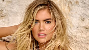 Kate Upton was photographed by Yu Tsai in Mexico. Swimsuit by Normaillot.