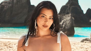 Lauren Chan was photographed by Ben Watts in Bermuda. Swimsuit by Beach Riot. Earrings by JÉBLANC.