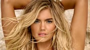 Kate Upton was photographed by Yu Tsai in Mexico. Swimsuit by Normaillot.
