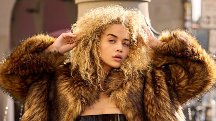 Jasmine Sanders was photographed by Derek Kettla in Saas-Fee, Switzerland. Top by Adriana Degreas. Swimsuit by Bananhot. Jacket by Adrienne Landau.