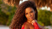 Kamie Crawford was photographed by Derek Kettela in Belize. Swimsuit by Los Angeles Apparel. Shirt by Santa Brands.