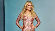 Molly Sims was photographed by Yu Tsai in Hollywood, Fla. Dress by Marc Bouwer. Shoes by Jimmy Choo. Jewelry by Charlie Lapson.