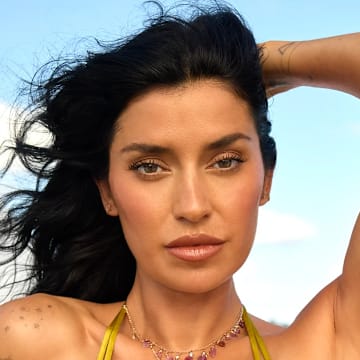 Nicole Williams English was photographed by Yu Tsai in Jamaica. Swimsuit by Indah. Necklaces by Jacquie Aiche and Ettika
