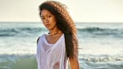 Naomi Osaka was photographed by Yu Tsai in Malibu, Calif. Dress by Di Pesta. Necklace by Khiry.
