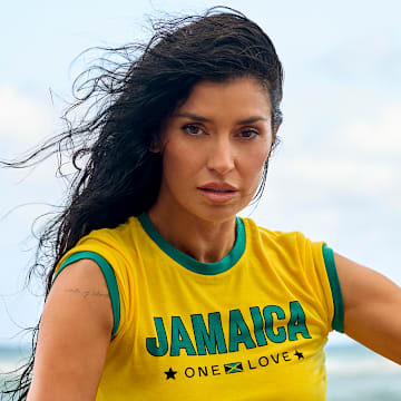 Nicole Williams English was photographed by Yu Tsai in Jamaica. Swimsuit by Andi Bagus. Top by MICAS. Body chain by Jacquie Aiche. 