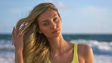 Cameron Brink was photographed by Ben Horton at The Boca Raton. Swimsuit by Andi Bagus. Swimsuit embroidered by Abbode.