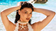 Lauren Chan was photographed by Ben Watts in Bermuda. Swimsuit by PQ Swim. Necklace by Andi Bagus.