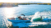 Alexa Score drops in on a huge wake behind a beauty of a MasterCraft rocking the SurfStar system