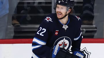 Mar 30, 2025; Winnipeg, Manitoba, CAN; Winnipeg Jets center Mason Appleton (22) celebrates his goal against the Vancouver Canucks in the third period at Canada Life Centre. Mandatory Credit: James Carey Lauder-Imagn Images
