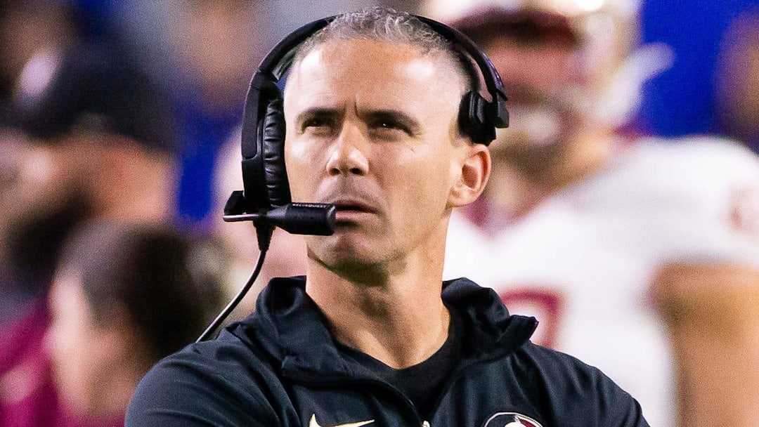 Florida State Seminoles head coach Mike Norvell looks to the replay screen at Steve Spurrier Field at Ben Hill Griffin Stadium in Gainesville, FL on Saturday, November 25, 2023 during the first half. [Doug Engle/Gainesville Sun]