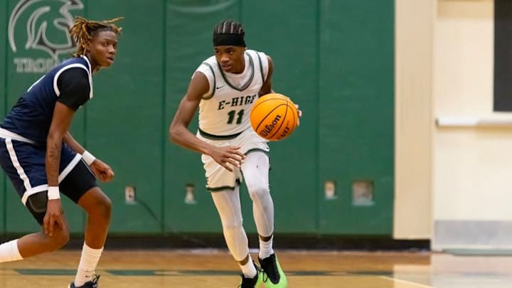 Evans High's David Rushing pushes the ball up the floor during a recent game. Rushing has helped lead the Trojans to an 18-4 record and the No. 3 ranking in this week's High School on SI Top 25 Central Florida Boys Basketball rankings. Evans High's David Rushing pushes the ball up the floor during a recent game. Rushing has helped lead the Trojans to an 18-4 record and the No. 3 ranking in this week's High School on SI Top 25 Central Florida Boys Basketball rankings.