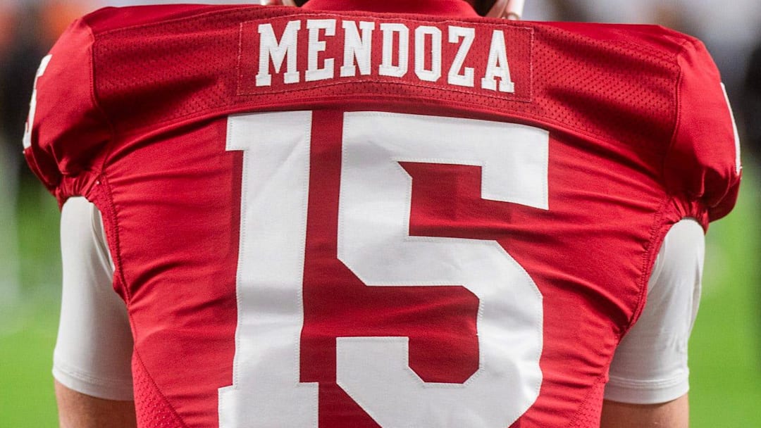 Indiana's Fernando Mendoza (15) gets loose before the College Football Playoff National Championship college football game at Hard Rock Stadium in Miami Gardens on Monday, Jan. 19, 2026.