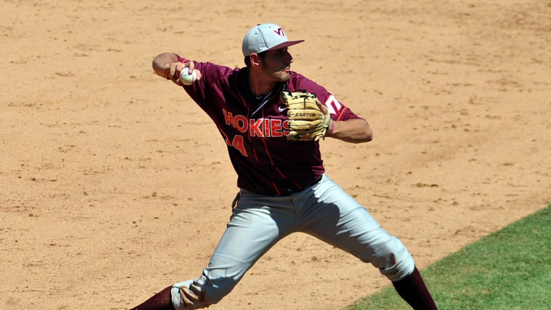 May 26, 2013; Durham, NC, USA;  Virginia Tech Hokies third baseman Brendon Hayden (34) throws to first base against the North Carolina Tar Heels during the ACC baseball tournament at Durham Bulls Athletic Park. Mandatory Credit: Rob Kinnan-Imagn Images