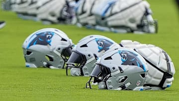 Jul 30, 2024; Charlotte, NC, USA; Carolina Panthers helmets at Carolina Panthers Practice Fields. Mandatory Credit: Jim Dedmon-Imagn Images