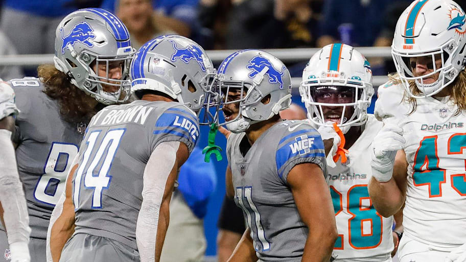 Detroit Lions wide receiver Kalif Raymond (11) celebrates a catch against the Dolphins with Amon-Ra St. Brown (14)  | Junfu Han / USA TODAY NETWORK