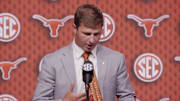 Texas safety Michael Taaffe wears a tie with the initials of Camp Mystic victims from the devastating floods that swept through central Texas during the Fourth of July.