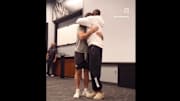 Colorado Buffaloes coach Deion Sanders shares a sweet moment with running back Charlie Offerdahl after Offerdahl announces his plans to leave the team.