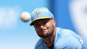 Tampa Bay Rays pitcher Shane McClanahan (18) throws a pitch against the New York Mets in the second inning during spring training at Charlotte Sports Park. 