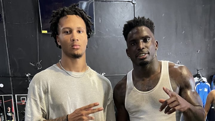 Quanell X Farrakhan Jr.  poses at a workout with Miami Dolphins wide receiver Tyreek Hill in the Houston area on Monday. 