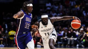 Former Virginia basketball player Marial Shayok handles the ball for South Sudan against the United States in a USA Basketball Showcase game in London.