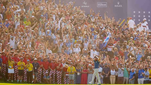 Tommy Fleetwood of Team Europe celebrates on the 16th hole after clinching the 2023 Ryder Cup.