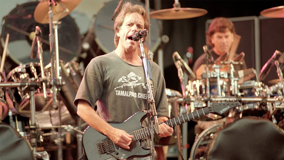 Bob Weir performing in a Tamalpais Chiefs shirt.