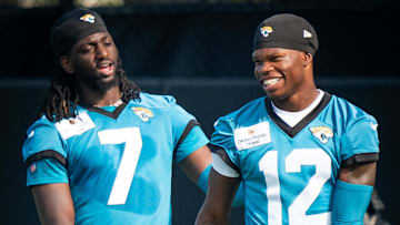 Jacksonville Jaguars wide receiver Brian Thomas Jr. (7) and Jacksonville Jaguars wide receiver Travis Hunter (12) have a laugh while running drills during the seventh organized team activity at the Miller Electric Center in Jacksonville, Fla. Monday, June 2, 2025. [Doug Engle/Florida Times-Union]