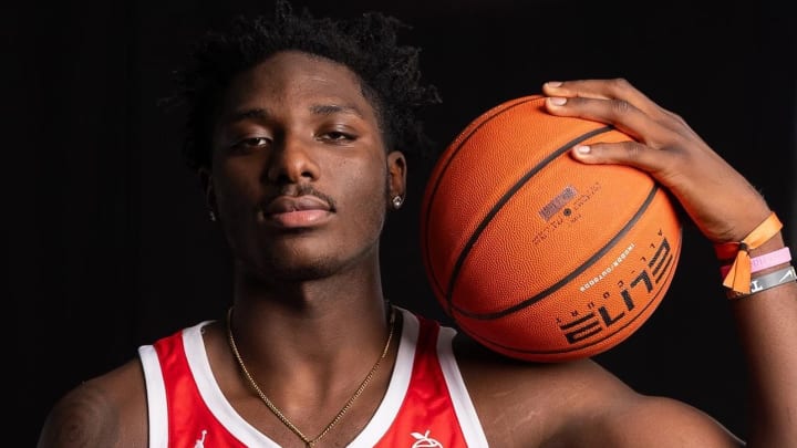 Elite football and basketball recruit poses in his Team CP3 uniform.