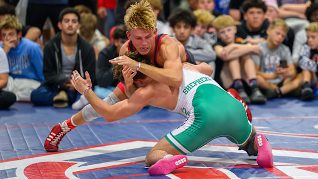 Brandt Harer of Mongomery (Pa.) works for an advantage during his 4-0 win over Clinton Shepherd of Indiana at 144-pound.