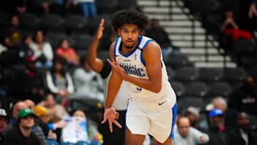 Orlando Magic two-way guard Ethan Thompson celebrates a made three for the Osceola Magic.