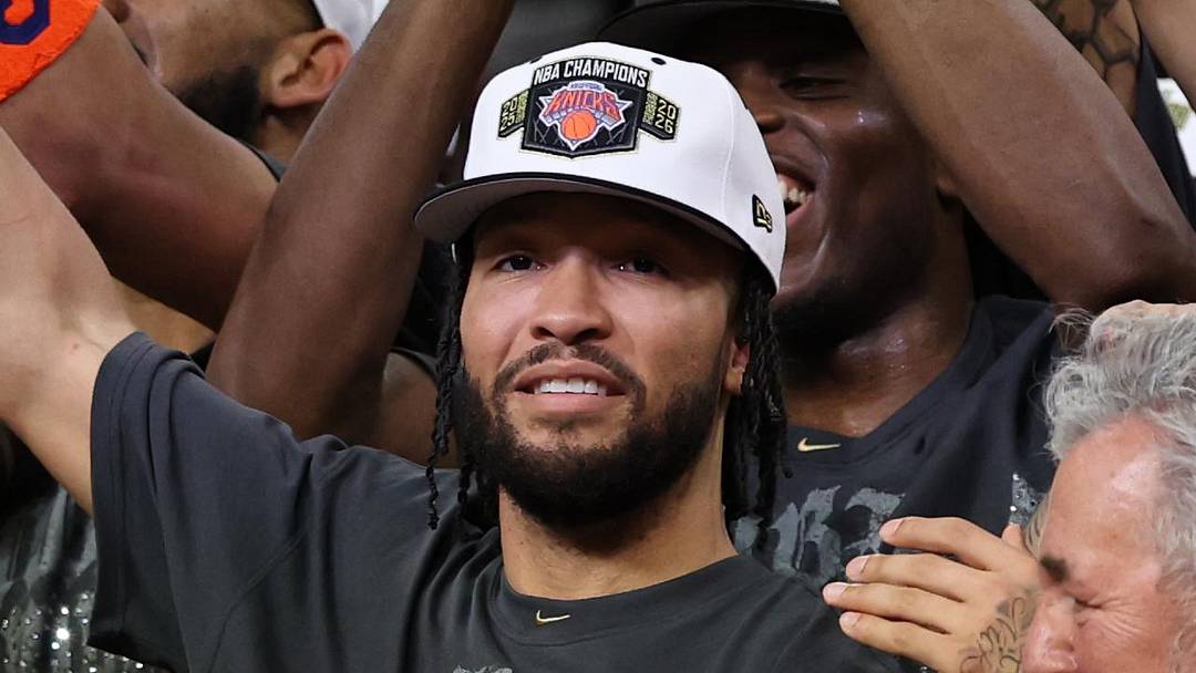 Jun 13, 2026; San Antonio, Texas, USA; New York Knicks guard Jalen Brunson holds the Finals MVP trophy during the championship celebration after game five of the 2026 NBA Finals against the San Antonio Spurs at Frost Bank Center. Mandatory Credit: Geoff Burke-Imagn Images