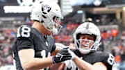 Dec 7, 2025; Paradise, Nevada, USA;  Las Vegas Raiders tight end Brock Bowers (89) reacts with wide receiver Jack Bech (18) after scoring a touchdown against the Denver Broncos during the first half at Allegiant Stadium. Mandatory Credit: Stephen R. Sylvanie-Imagn Images