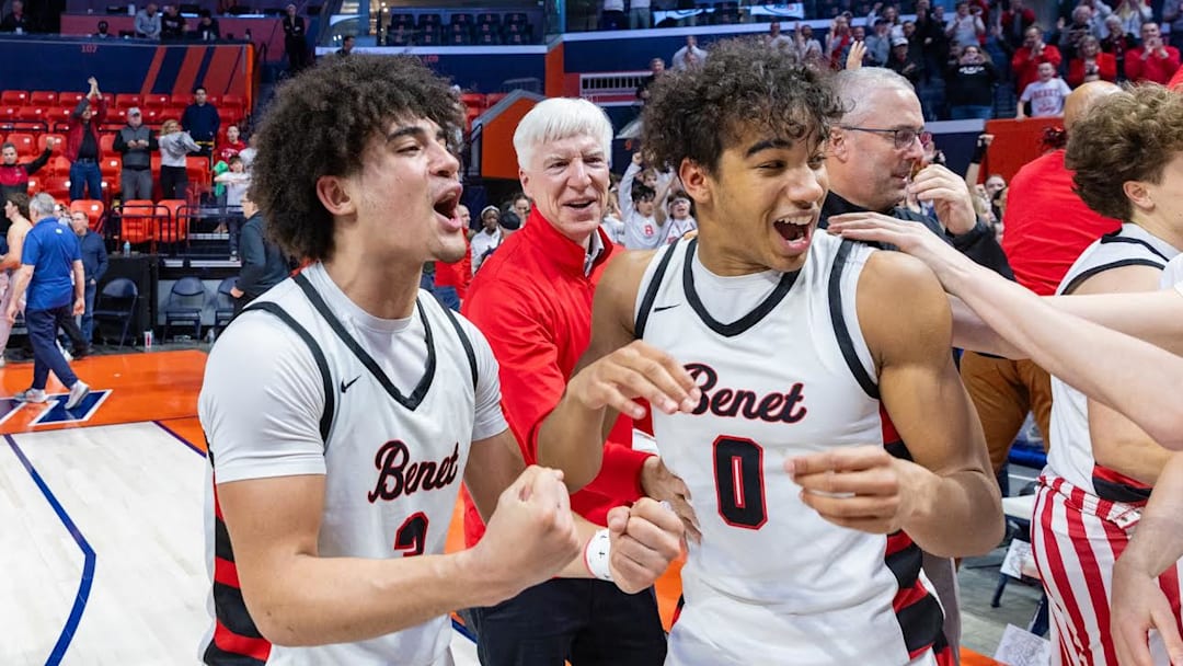 Benet's Jayden Wright (left) and Blake Fagbemi celebrate the Redwings' 55-54 win over Warren in the IHSA Class 4A state championship game on March 15 in Champaign.
