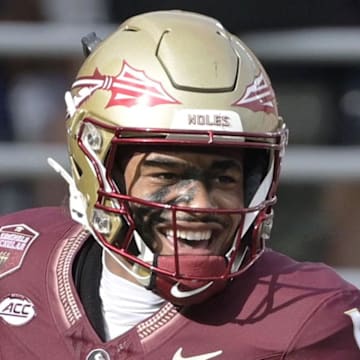 Aug 30, 2025; Tallahassee, Florida, USA; Florida State Seminoles quarterback Tommy Castellanos (1) celebrates with wide receiver Micahi Danzy (19) after a touchdown against the Alabama Crimson Tide during the second half at Doak S. Campbell Stadium. Mandatory Credit: Melina Myers-Imagn Images