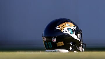 Jul 24, 2025; Jacksonville, FL, USA; Jacksonville Jaguars place kicker Cam Little (39) helmet sits on the field during training camp at Miller Electric Center. Mandatory Credit: Nathan Ray Seebeck-Imagn Images
