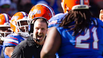 Florida Gators head coach Billy Napier celebrates a fourth down stop on the Rebels during the second half at Ben Hill Griffin Stadium in Gainesville, FL on Saturday, November 23, 2024. The Gators defeated the Rebels 24-17 [Doug Engle/Gainesville Sun]