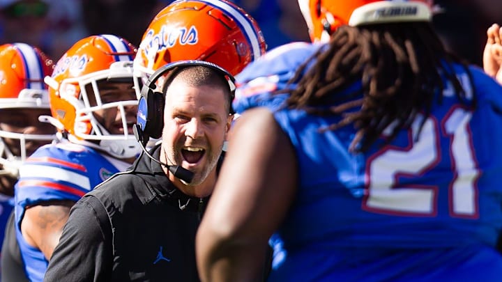 Florida Gators head coach Billy Napier celebrates a fourth down stop on the Rebels during the second half at Ben Hill Griffin Stadium in Gainesville, FL on Saturday, November 23, 2024. The Gators defeated the Rebels 24-17 [Doug Engle/Gainesville Sun]