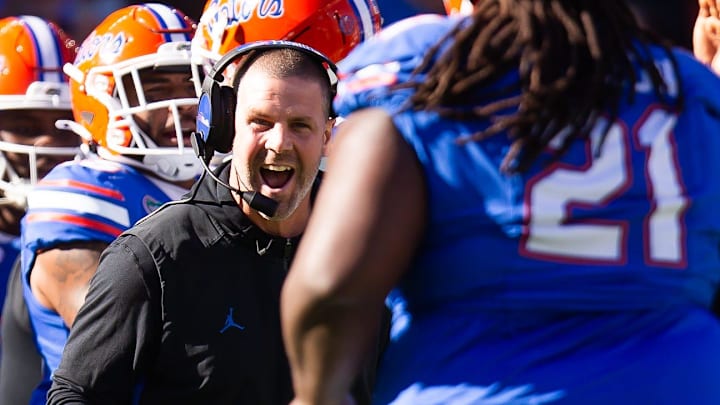 Florida Gators head coach Billy Napier celebrates a fourth down stop on the Rebels during the second half at Ben Hill Griffin Stadium in Gainesville, FL on Saturday, November 23, 2024. The Gators defeated the Rebels 24-17 [Doug Engle/Gainesville Sun]